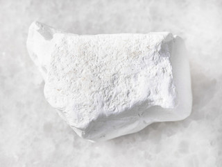 chalk stone on white marble