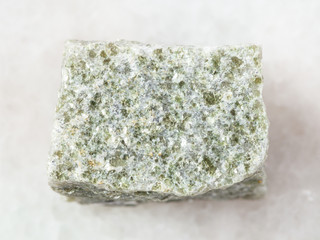 raw quartz-mica schist stone on white