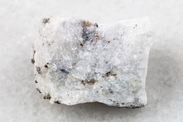 raw carbonatite stone on white