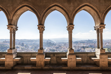 Fototapeta Leiria, Portugal. Overlooking view of the city of Leiria from the Gothic arcade of the Paco de D Joao I (Palace of John I) obraz