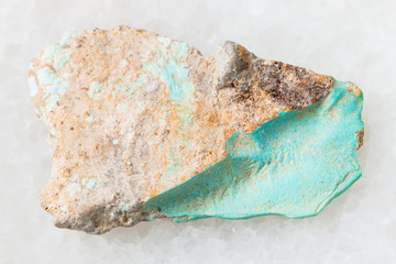 rough Turquoise gemstone on white