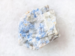 raw vishnevite stone on white