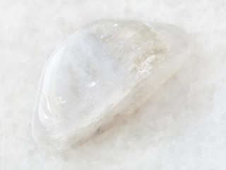 polished white moonstone (adularia) gem on white