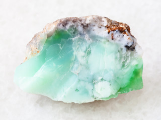 rough crystal of Chrysoprase gemstone on white © vvoe