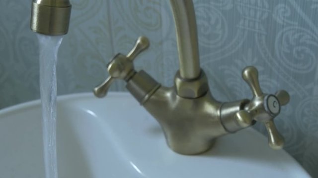 Water faucet turned on 