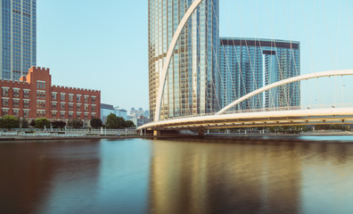 Tianjin city waterfront downtown skyline with Haihe river,China.