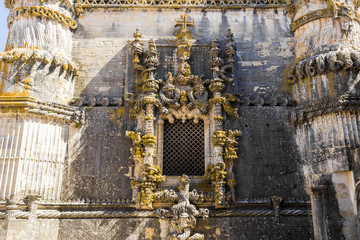 The famous chapterhouse window of the Convent of Christ in Tomar, Portugal, a well-known example of...