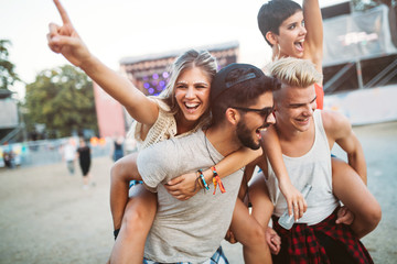 Group of friends having fun time at music festival - obrazy, fototapety, plakaty