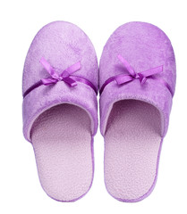 Violet home slippers with ribbon isolated on white background. Close up, high resolution