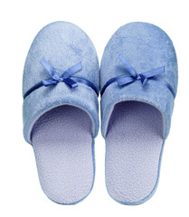 Blue home slippers with ribbon isolated on white background. Close up, high resolution