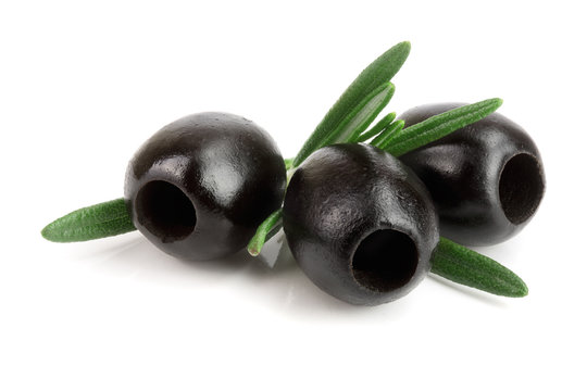 whole black olives with rosemary leaf isolated on white background macro