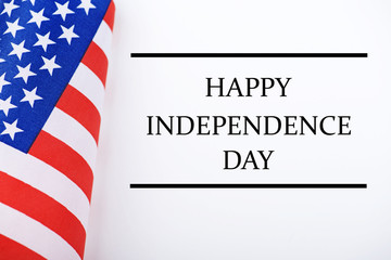 Background of United States flag on white background next to text about Independence day celebration.