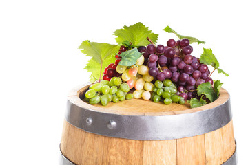 Grapes on wooden barrel