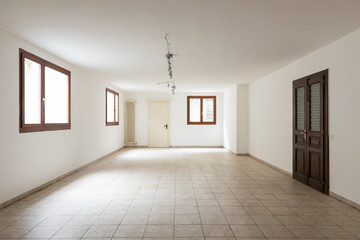 Large empty room with windows