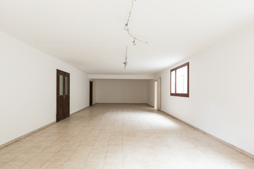 Large empty room with windows