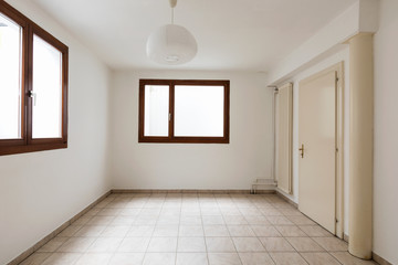 Obraz premium Large empty room with windows