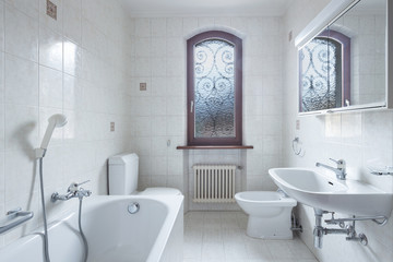 Retro bathroom in light tiles