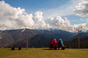Mature couple enjoying view of mountains.