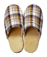 Yellow checkered slippers isolated on white background. Close up, high resolution