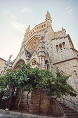 Fototapeta na wymiar Sant Bartomeu Church gothic architecture style cathedral in Soller, Mallorca in morning light