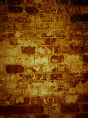 Shabby surface of ancient masonry of old brick wall