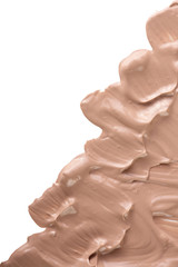 Beige liquid foundation makeup isolated on white background with copy space for your text. Top view. Flat lay pattern
