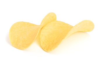 two potato chips on white background close-up