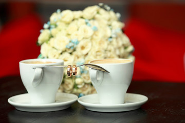 Wedding rings and on the spoon