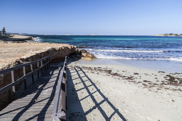 Fototapeta na wymiar Mediterranean beach, Es Calo des Moro, town of Sant Antoni, Ibiza island,Spain.