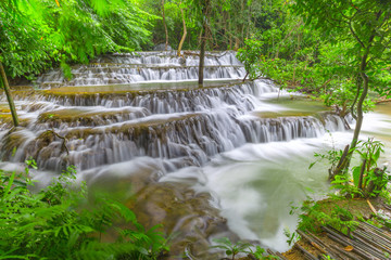 Naklejka premium Noppiboon waterfall in Tropical Rain Forest at Sangkhlaburi , Kanchanaburi Province, Thailand