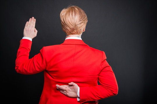 Back View Of Business Woman Taking Fake Oath