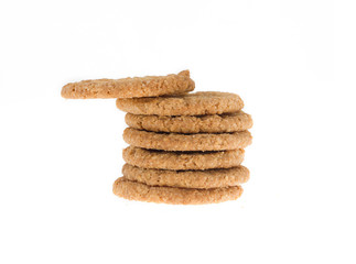 natural oat biscuits stacked on a white background