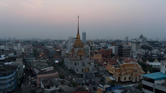 Dusk to night Traimit Wittayaram Temple in Bangkok's Chinatown, Thailand.