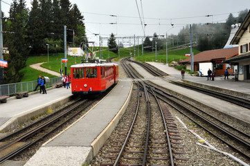 Obraz premium Lucerne, Switzerland - June 18, 2016: The Vitznau-Rigi Railway, Europe's first rack railway, operates between Vitznau, Rigi Kaltbad and Rigi Kulm.
