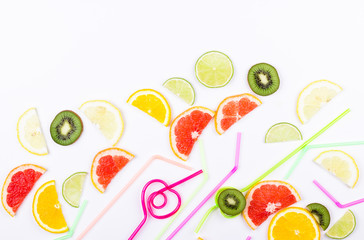 Flat lay citrus slices and straws