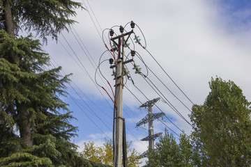 The old archaic electricity power line and the new one on backside