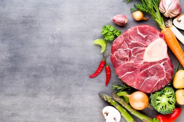 Photo sur Plexiglas Viande Raw fresh meat Ribeye Steak with vegetables and spice.