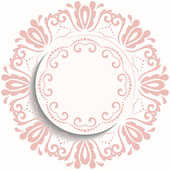 Round pink ornament with floral elements and arabesques. Pattern with arabesques. Fine greeting card