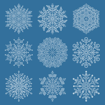 Set of white snowflakes. Fine winter ornament. Snowflakes collection. Snowflakes for backgrounds and designs