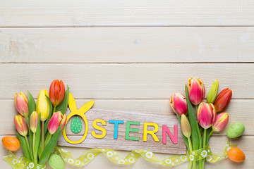 A colorful spring greetings card with tulips for Easter, Mother's Day.