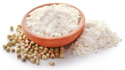 Fototapeta na wymiar Buckwheat with flour