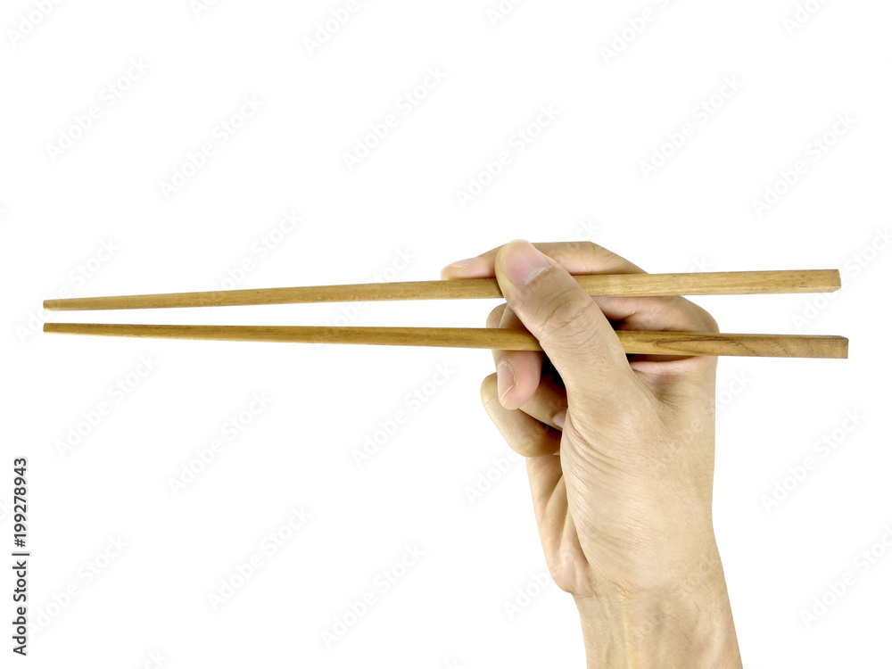 Wall mural right hand holding chopsticks, correct way to hold and use chopsticks, isolated on white background,