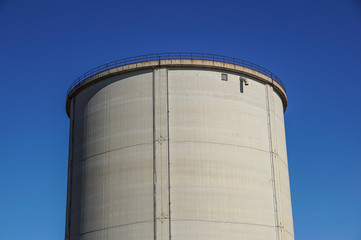 old cement silos and blue sky background