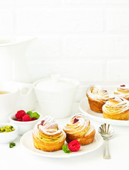 puff pastry with pistachios and raspberries.