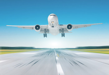 Fototapeta na wymiar Airplane flying departure landing speed motion on a runway in the clear sky bright day.