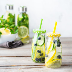Fresh cool lemon cucumber berry infused water detox drink