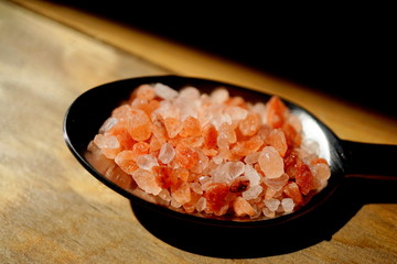 Himalayan salt in a spoon.