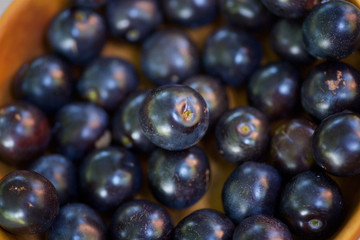 fruits are in the bowl on the table