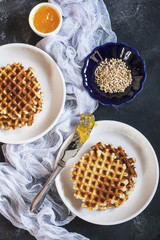 Bright and cozy Breakfast. Toast with butter and jam, pate. Family, happiness, joy, Easter holiday. top view. Close up. Vertical. Selective focus.