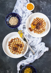 Bright and cozy Breakfast. Toast with butter and jam, pate. Family, happiness, joy, Easter holiday. top view. Close up. Vertical. Selective focus.